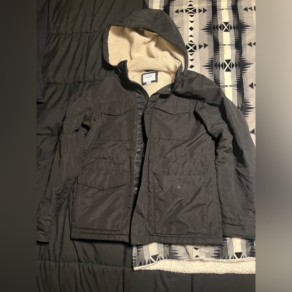 Small black old navy jacket. Heavy duty. Super warm. Not worn much.